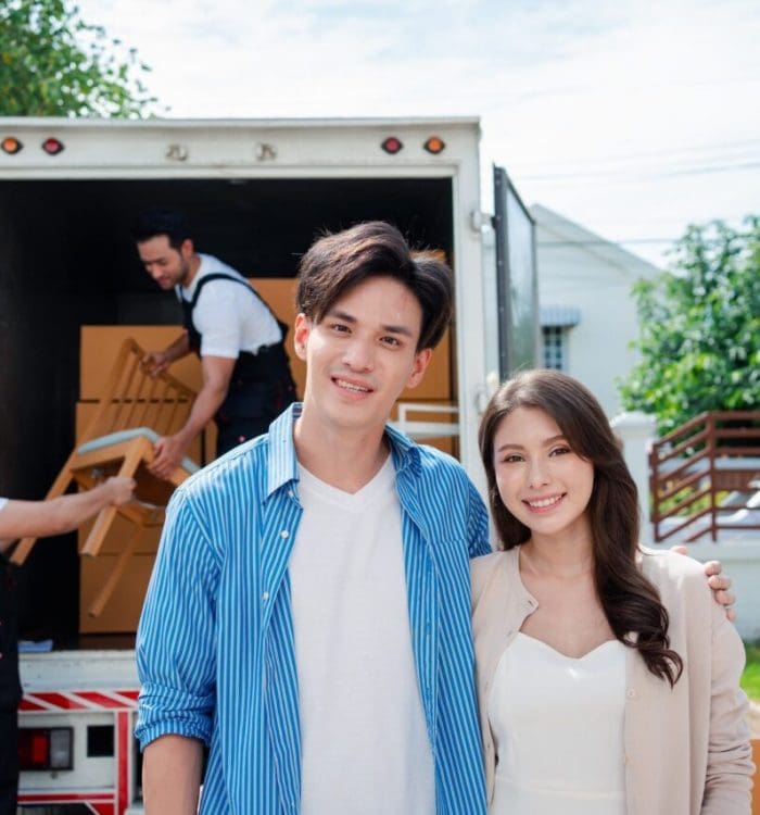 asian-couple-check-while-unloading-boxes-and-furniture-from-a-pickup-truck-1 asian-couple-check-while-unloading-boxes-and-furniture-from-a-pickup-truck-1
